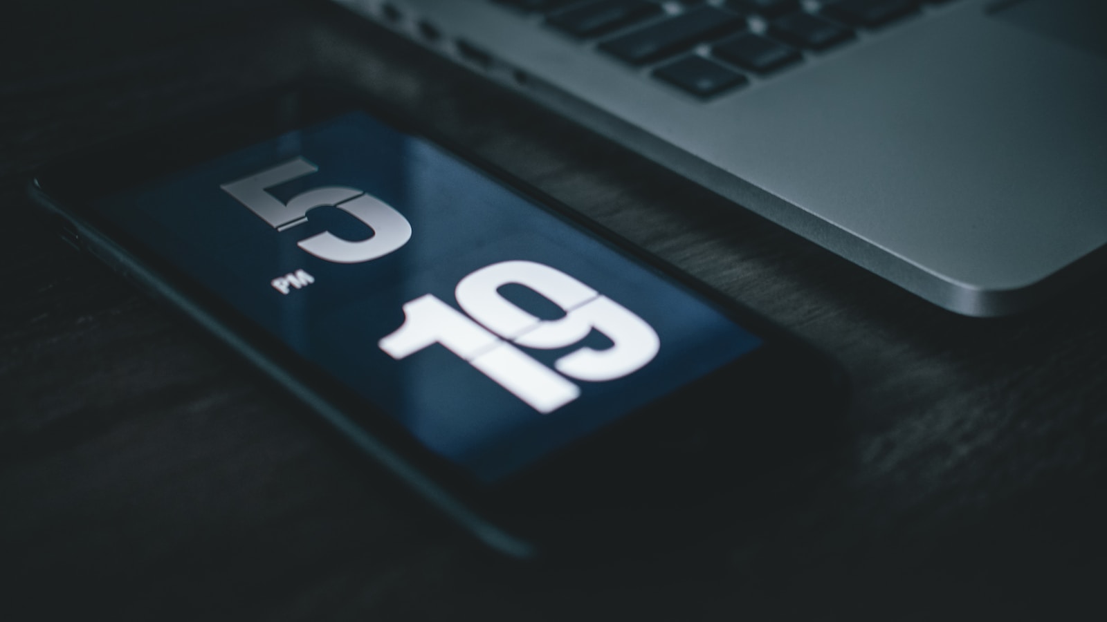A real smartphone desk scene used as a practical reference for abstract gradient visual assets.